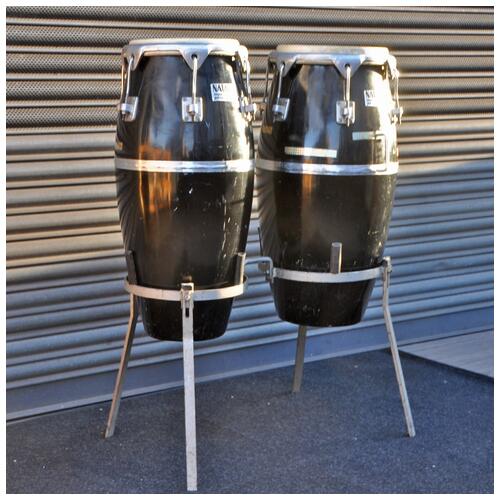 Image 1 - Natal 11" x 11.75" Vintage Congas Pair With Stand In Black Fibreglass finish *2nd Hand*